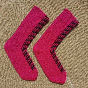 pink hand knit patterned panel socks