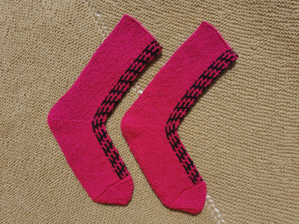 pink hand knit patterned panel socks