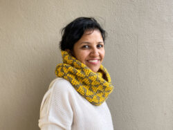 Butterly motif hand knit mosaic cowl in a camel brown and yellow combination